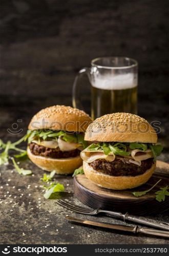 front view beef burgers with bacon beer