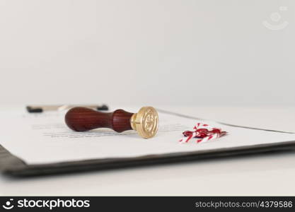 front view blurred certificate wax seal