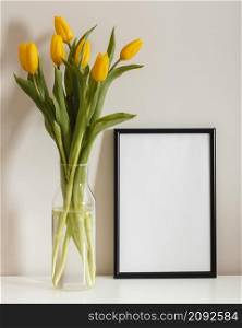 front view bouquet tulips vase with empty frame
