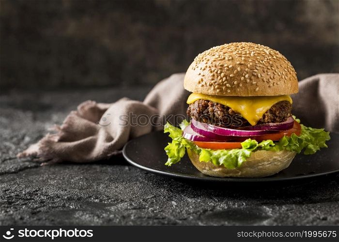 front view burger plate with kitchen towel
