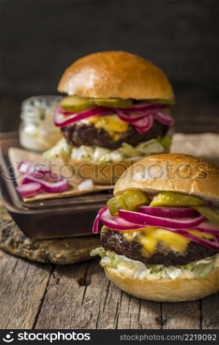 front view burgers with pickles