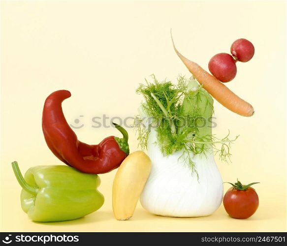 front view chili pepper with radish carrot