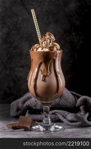 front view chocolate dessert glass with straw