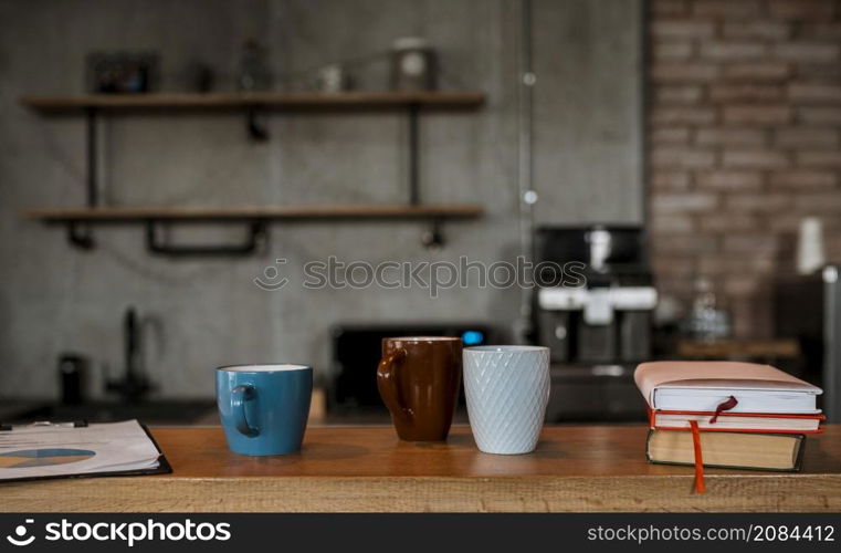 front view coffee mugs table counter