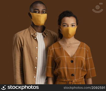 front view couple with face masks