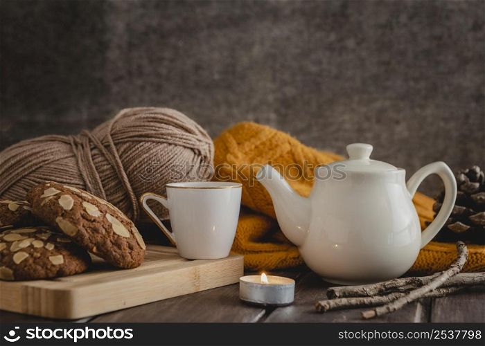 front view cup teapot with cookies yarn