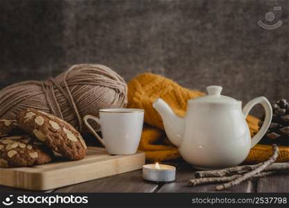 front view cup teapot with cookies yarn