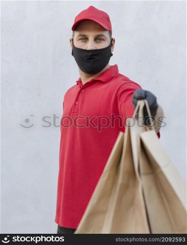 front view delivery man with package