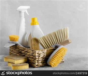 front view eco friendly cleaning brushes basket with solution