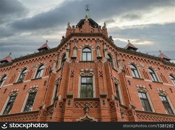 Front view facade brick building of Higher Seminary in Krakow, Poland. Front view brick building of Higher Seminary in Krakow, Poland