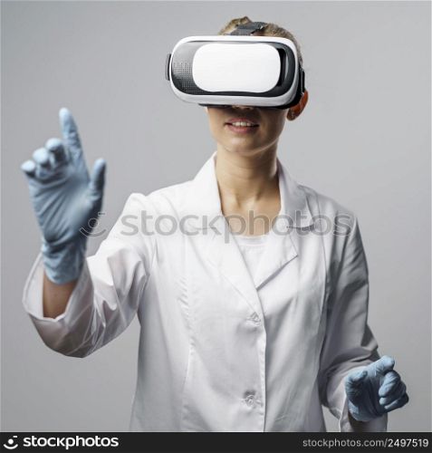 front view female researcher using virtual reality headset