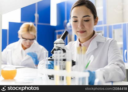 front view female scientists laboratory