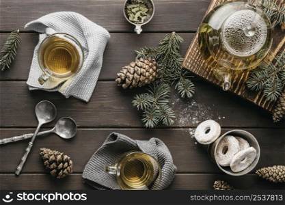 front view festive arrangement with tea pine cones