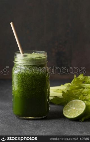 front view green healthy smoothie jar