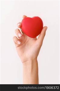 front view hand holding heart shape. High resolution photo. front view hand holding heart shape. High quality photo