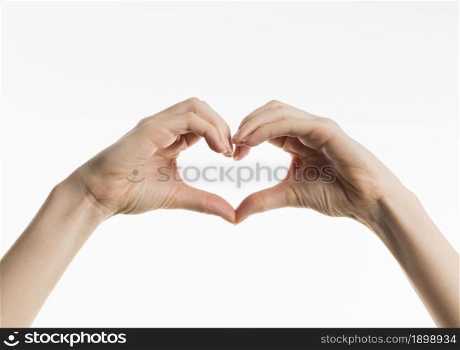 front view hands showing heart sign. Resolution and high quality beautiful photo. front view hands showing heart sign. High quality beautiful photo concept