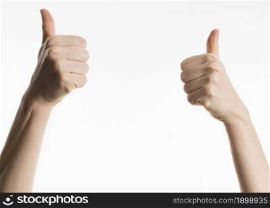 front view hands showing thumbs up. Resolution and high quality beautiful photo. front view hands showing thumbs up. High quality beautiful photo concept
