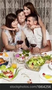 front view happy family dinner table. High resolution photo. front view happy family dinner table. High quality photo