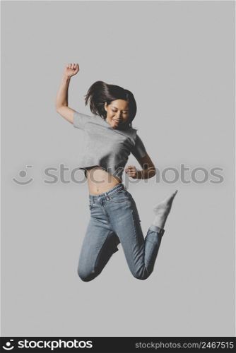 front view happy woman jumping air