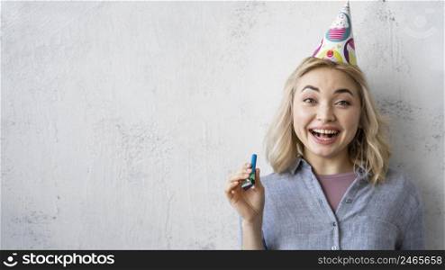 front view happy woman with party hat copy space