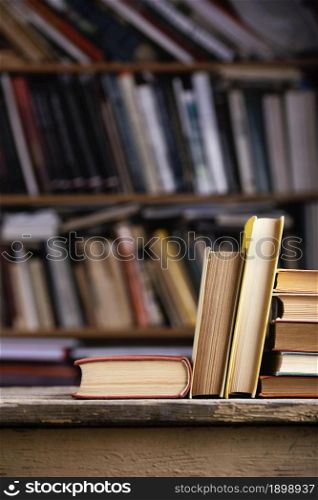 front view hardback books library. Resolution and high quality beautiful photo. front view hardback books library. High quality beautiful photo concept