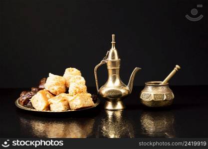 front view islamic pastries with black background