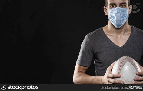 front view male rugby player with medical mask copy space