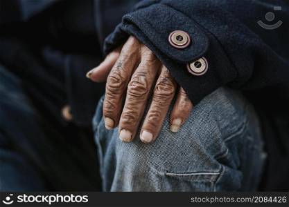 front view malnourished homeless man s hand