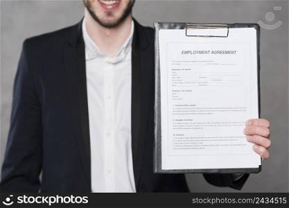 front view man holding contract new job