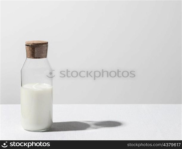 front view milk bottle with copy space