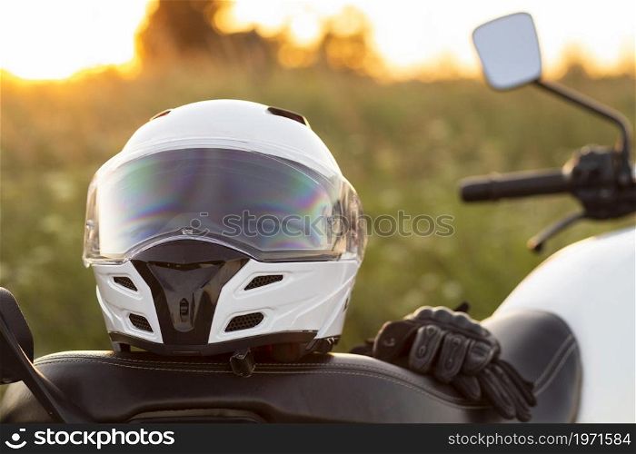 front view motorcycle helmet sitting bike. High resolution photo. front view motorcycle helmet sitting bike. High quality photo