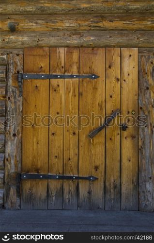 Front view of a door of a hut in Sudtirol
