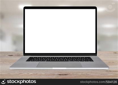 Front view of a generic modern laptop with a white screen on a wooden table (copy space).