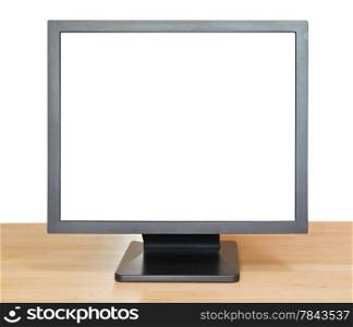 front view of black display with cut out screen on wooden table isolated on white background