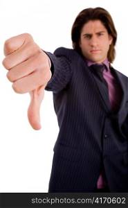 front view of businessman with thumbs down on an isolated white background