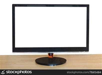 front view of computer black widescreen display with cutout screen on wood table isolated on white background