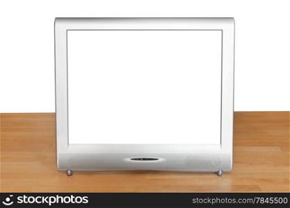 front view of grey TV set display with cut out screen on wooden table isolated on white background