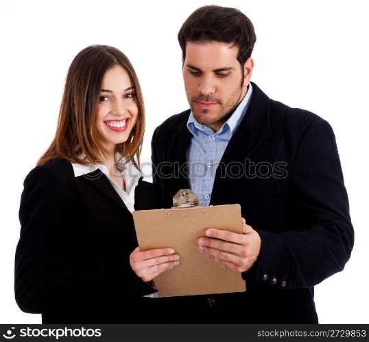Front view of male and female colleagues holding notepad and discussing against white isolated background