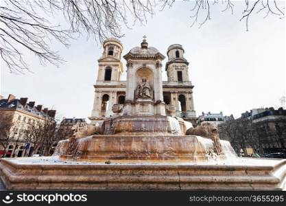 front view of of Saint-Sulpice fontain and church in Paris, France