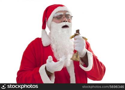 Front view of Santa Claus holding chocolate bar with eyes closed over white background