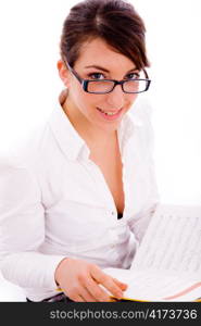 front view of smiling female student against white background