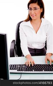 front view of woman working on computer with white background