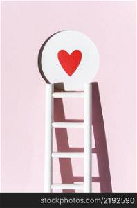 front view paper heart with ladder