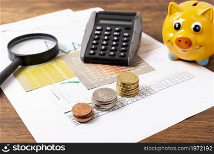 front view piggy bank stationery items. High resolution photo. front view piggy bank stationery items. High quality photo