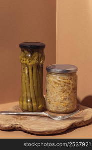 front view preserved food jars with fork