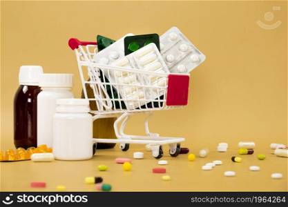 front view shopping cart with pill foils containers. High resolution photo. front view shopping cart with pill foils containers. High quality photo
