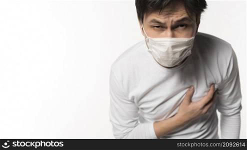 front view sick man touching his chest pain