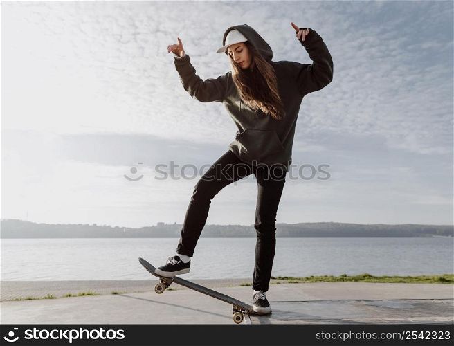 front view skater girl doing trick