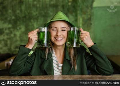 front view smiley woman with hat celebrating st patrick s day bar