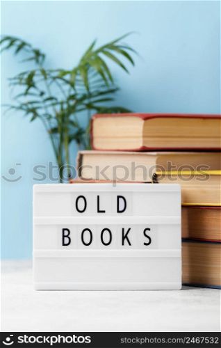 front view stacked books with light box